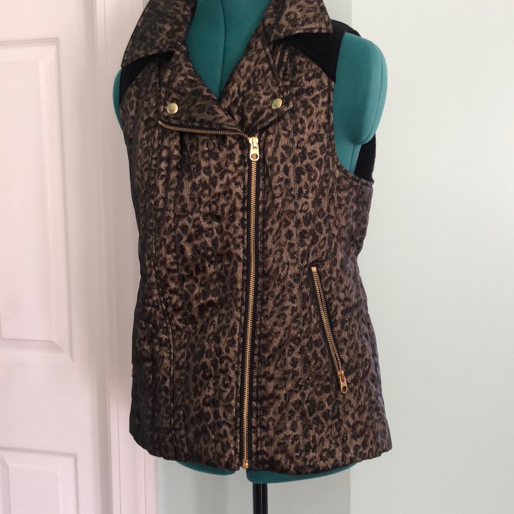 Gold and black sheer leopard vest. Gold zippered pockets . Never worn.